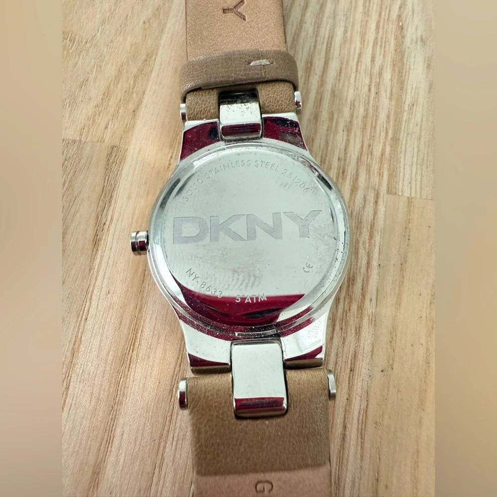 DKNY ladies silver tone tan leather dress watch NEW BATTERY
